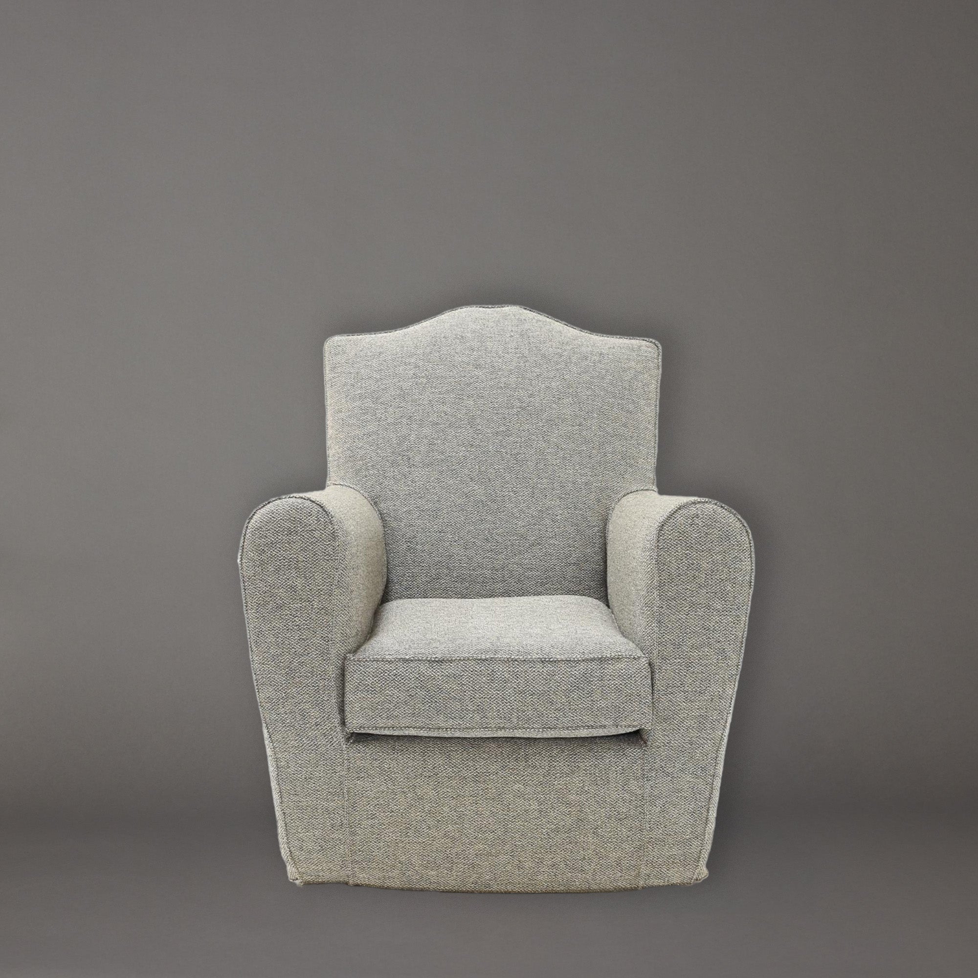 Wellington Gray armchair by Verellen on a gray background